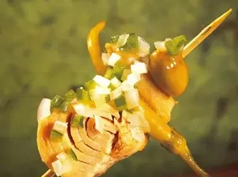 Pincho de aceituna, guindilla, bonito, espárrago y vinagreta